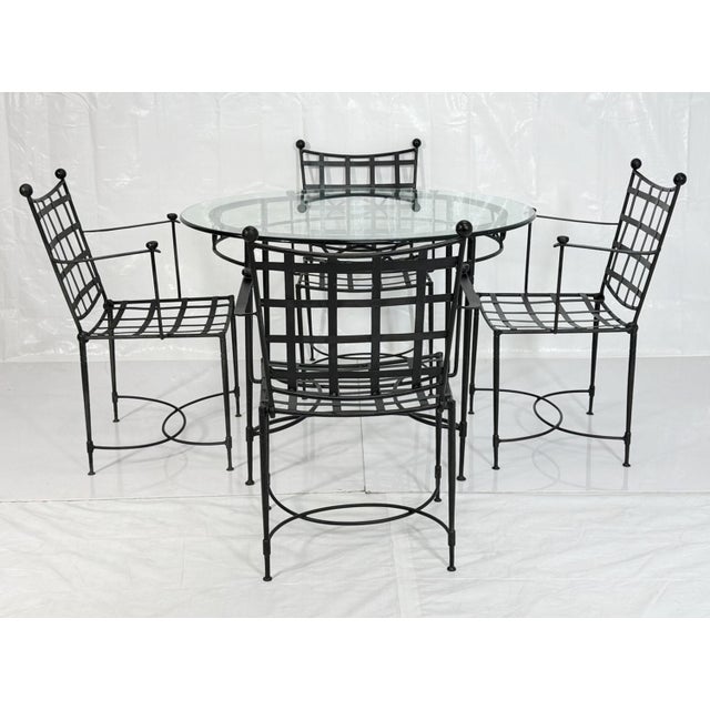 An exceptional five-piece dining set designed by Mario Papperzini and produced in Italy for Janus et Cie, comprising a...