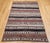 Woven over a century ago by the nomadic Shahsavan tribes of Northwest Persia, this rare early 1900s kilim is a beautifully...