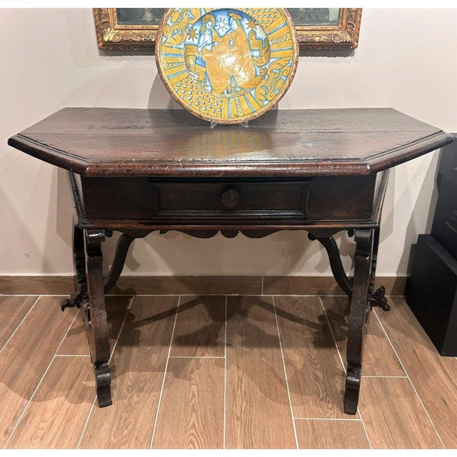Splendid walnut console with dark patina, perfect for a study or a beautiful living room. This is a high-quality piece of...