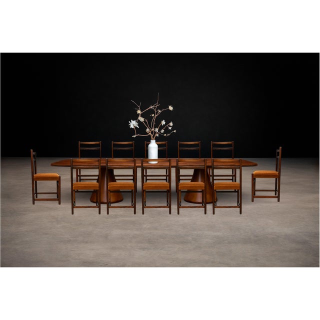 An exceptional and increasingly rare set of twelve Brazilian modern dining chairs designed by Celina Zilberberg, executed...