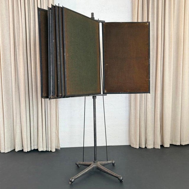 This is a vintage industrial multi-panel display stand, likely used for showcasing charts or graphs for a business...