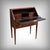 Superb Louis XVI-style sloping desk, crafted in the 19th century, in p. and mahogany marquetry. Its drop-leaf is adorned...