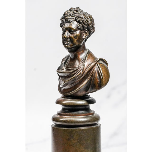 This impressive early nineteenth century pair of English bronze busts depicts royalty in the neoclassical tradition,...