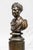 This impressive early nineteenth century pair of English bronze busts depicts royalty in the neoclassical tradition,...