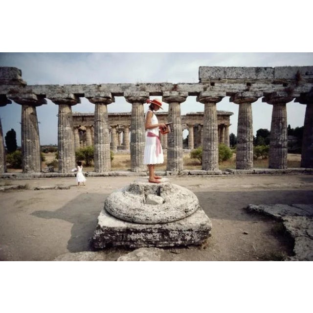 Laura Hawk In Paestum 1984 by Slim Aarons Slim Aarons Limited Estate Edition Laura Hawk, assistant to the photographer,...
