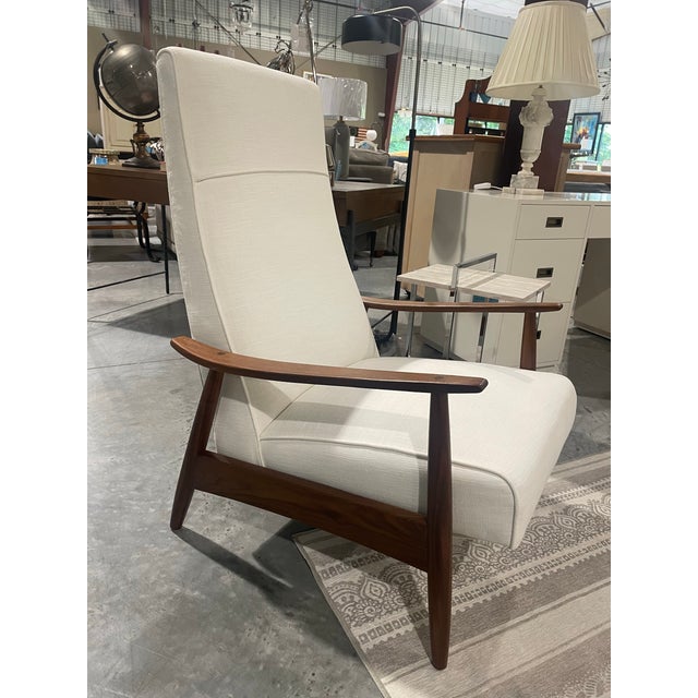 This Milo Baughman Recliner 74 features a clean white textured stain-resistant fabric and a solid walnut wood frame. The...