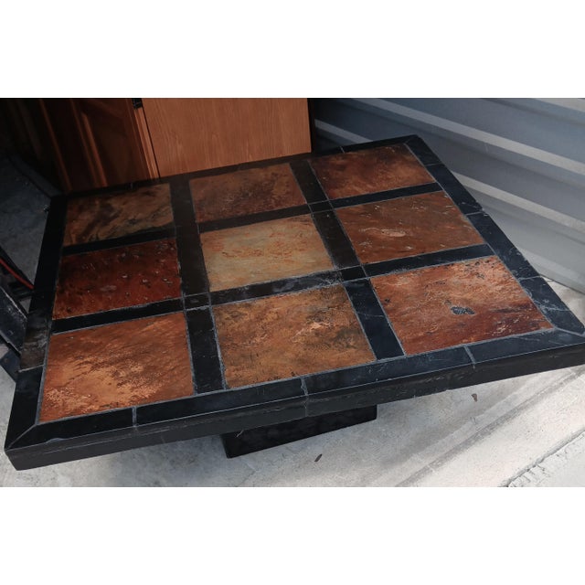 Slate and wood 80s coffee table. 2 pieces. One small chip, approx 1.75 inches invone corner. Appropriate wear for age and...