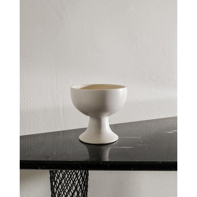 Rare French mid century white bowl vase on a sculptural foot attributed to Georges Jouve produced by anonymous designer in...