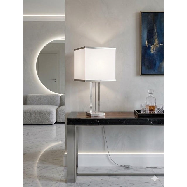 An elegant table lamp created in the 1970s. Its sleek, minimalist design is characteristic of Italian production from the...