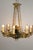 Restored chandelier in the Empire style, from France around 1930. The chandelier is in very good condition considering its...