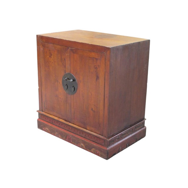Retrieved from Shanxi Province, this 19th century refined cabinet is crafted from solid elm wood. The rectangular body is...