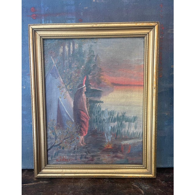 A beautifully atmospheric antique landscape painted in 1921 and signed H. Noble, capturing a quiet moment along the water...