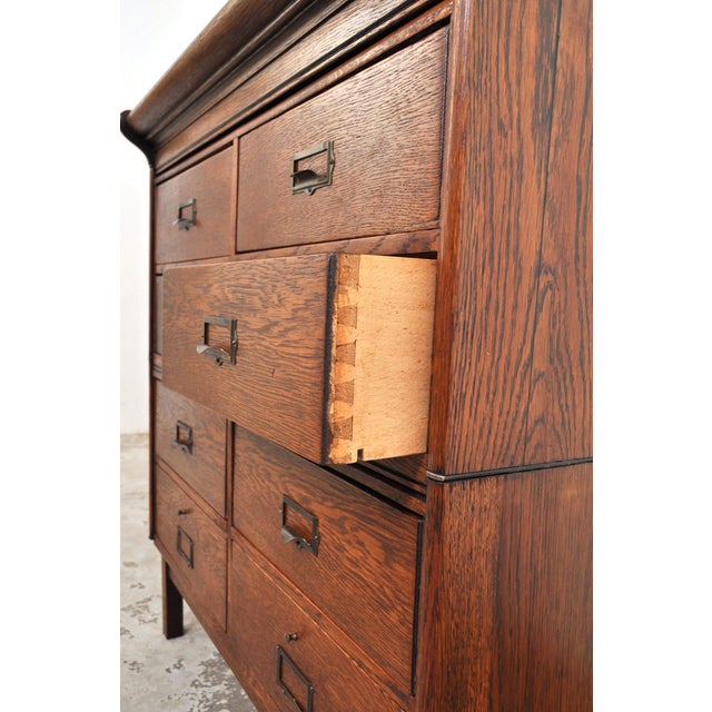 Best known for their modular bookcases with glass drop-down doors, the manufacturer also produced this rather rare chest...
