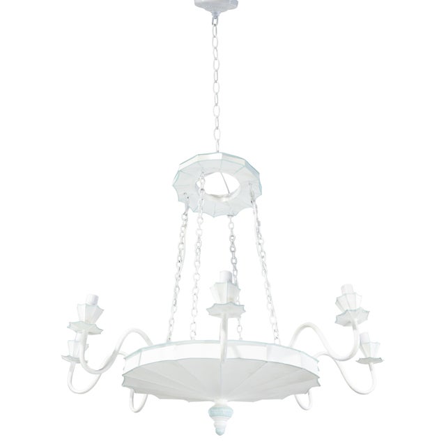This vintage handmade iron 8-light chandelier features a unique tiered pendant design with a crisp white finish accented...
