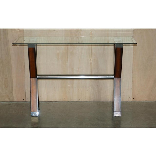 We are delighted to offer this lovely, chrome tipped, x framed console table with bevelled edge glass top A very good...