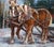 Surefooted Team by Lindsey Bittner Graham | Oil on board Horses pulling a sled in a snowy landscape. For Sale