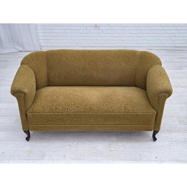 1950s, Danish 2-seater sofa. Original green furniture wool, ash wood legs, brass springs in the seat. Original good...