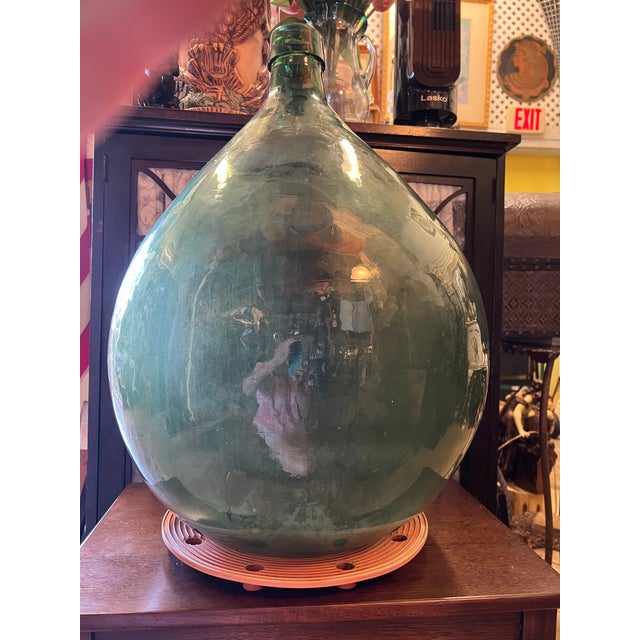 Demijohn / Carboy originally used for transporting wine back in the day. Composed of 'blown-to-mold' glass (a method...