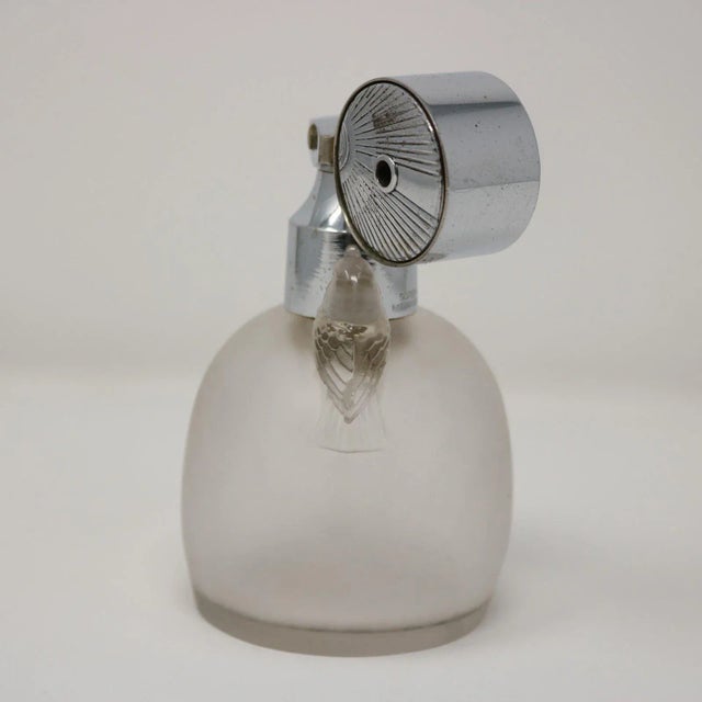Rene Lalique Frosted Glass 'Marcel Frank Perruches' perfume bottle with atomiser. This pattern features two birds, sitting...
