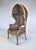 An exquisite vintage French Country / Louis XV style double caned canopy Porter's chair with hand painted faux distressed...