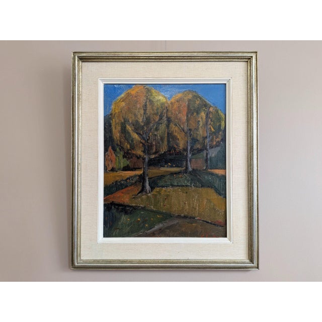 TREES IN AUTUMN Size: 22.2 x 19.1 inches (including frame) Oil on canvas A very pleasant mid-century landscape painting...