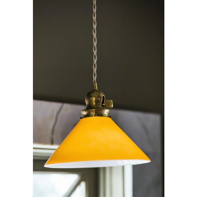 Suspended from a single canopy, this pendant light is perfect for vanities, dining rooms, or kitchen islands. The vintage...