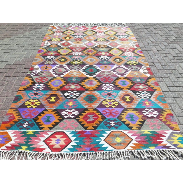 The Rug you are about to purchase is a Vintage Handmade Turkish Rug that is considered a collection piece due to its value...