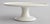 A gorgeous antique French white ironstone cake stand on a pedestal, circa 1890. No maker's mark. This gorgeous cake stand...
