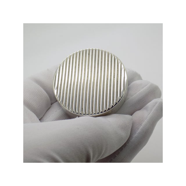 As with all vintage pieces, this item shows minor signs of age and use consistent with its history. The photographs form...