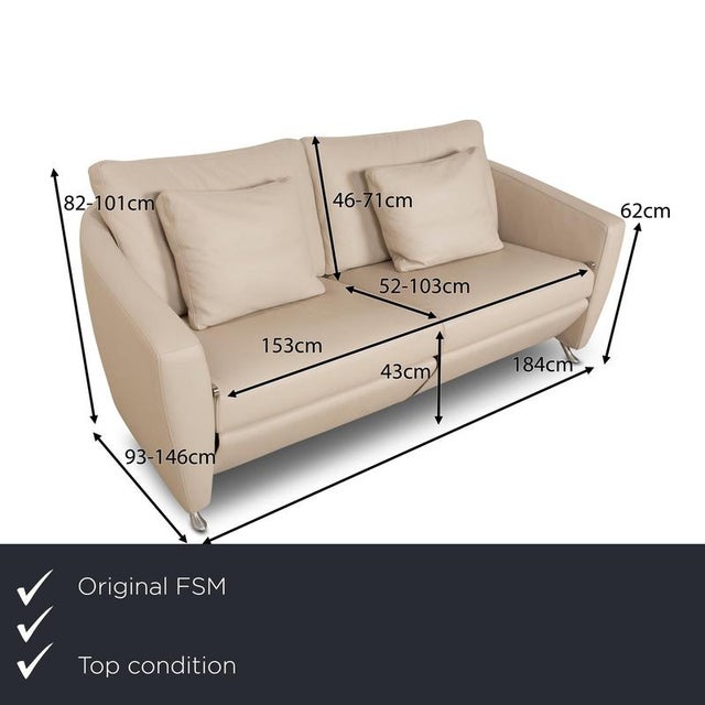 The Sesam sofa from FSM is covered in cream-colored genuine leather and stands on narrow metal feet. It is characterized...