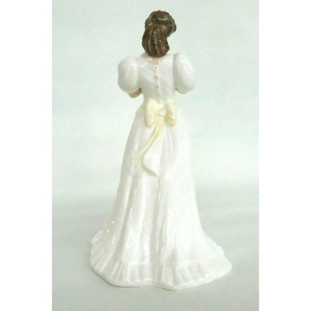 This lovely figurine is made of bone china / porcelain. This beautiful figurine is stamped as having been made in England...
