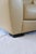 A generous postmodern club armchair from the 1980s, upholstered in butter yellow faux leather. The low rounded silhouette,...