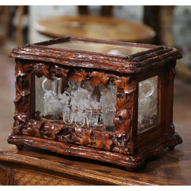 Create an elegant bar area with this complete antique "Cave à Liqueur"! Created in France, circa 1870 and shaped as a wood...