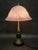 Elegant french art nouveau table lamp from the 1920s, crafted from polished brass, black marble and beautifully marbled...