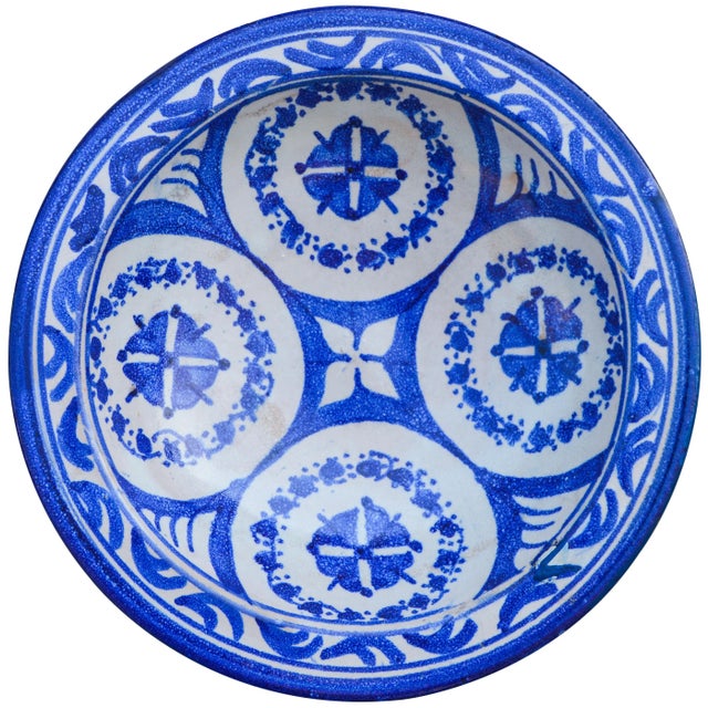 Handcrafted ceramic plate with an elaborate hand-painted Moorish pattern in blue and white. Made in Fez, Morocco. No...