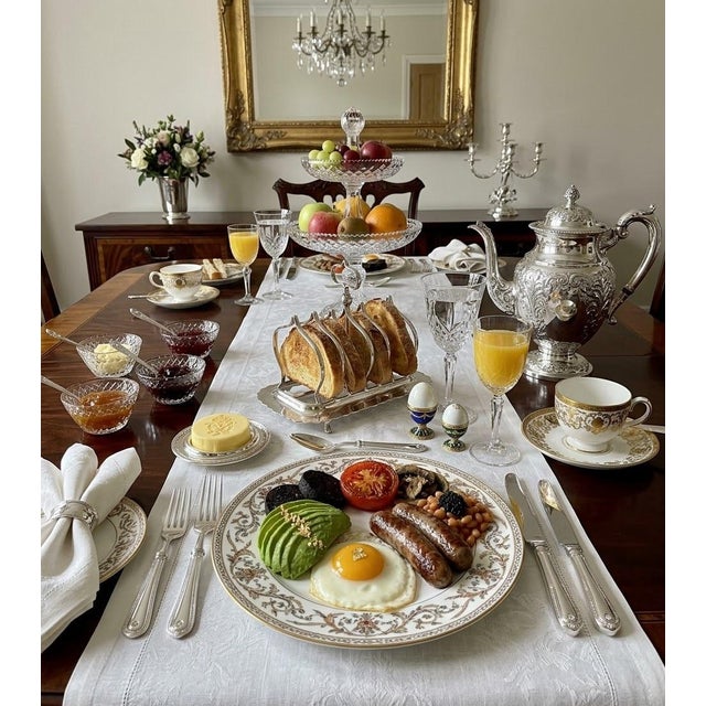 A beautifully crafted Mappin & Webb “Triple Deposit” Princes Plate Footed Toast Rack, sized for six slices and very unique...