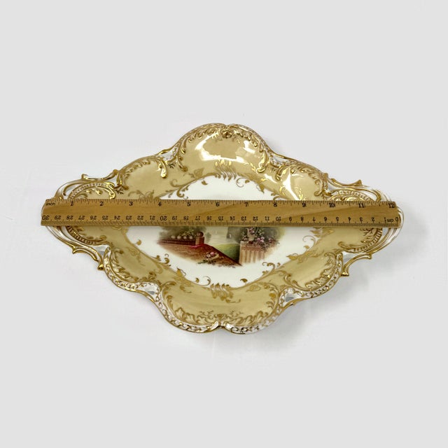 Add a touch of timeless elegance to your table setting or collection with this exquisite Antique Victorian Oval Porcelain...