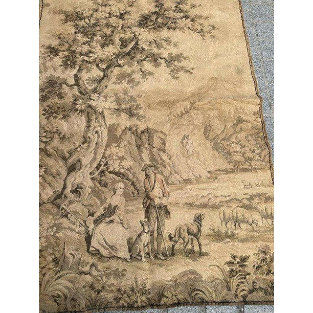 Beautiful early 20th-century Jacquard-woven tapestry, depicting a charming pastoral landscape with shepherds, sheep and...