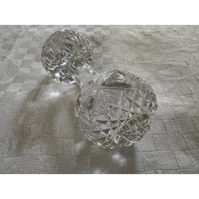 A large sized 19th C brilliant cut crystal master knife rest. This piece has two intricately carved balls at either end....