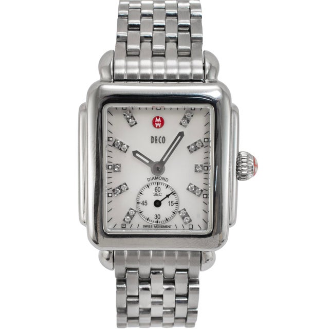 Brand: Michele by Fossil Gender: Ladies Metal Type: Stainless Steel Length: 6.50 inches Diameter: 29.00 mm Weight: 90.21...