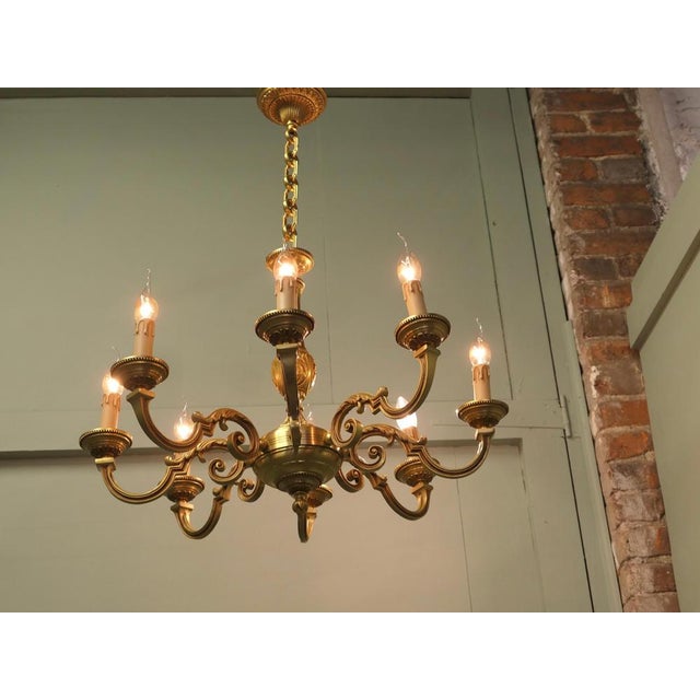 Large French Gilded Brass Chandelier This is a very good quality piece, it has 8 arms and hangs from a chain which could...