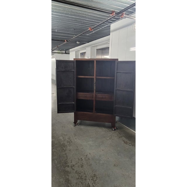 Scholar Cabinet 37.875w x 16.75d x 59.75h This is a square corner cabinet with a central stile between the doors. The...