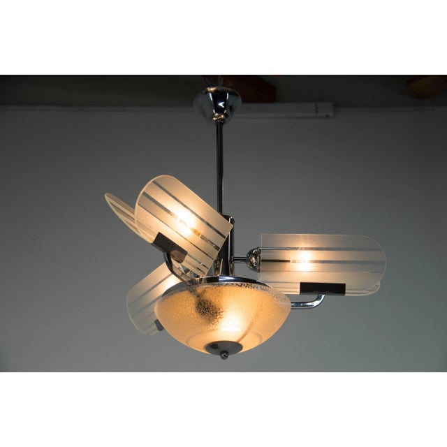 Unusual chandelier with butterfly-like sandblasted glass shades. Perfect original condition. Cleaned, polished, rewired:...