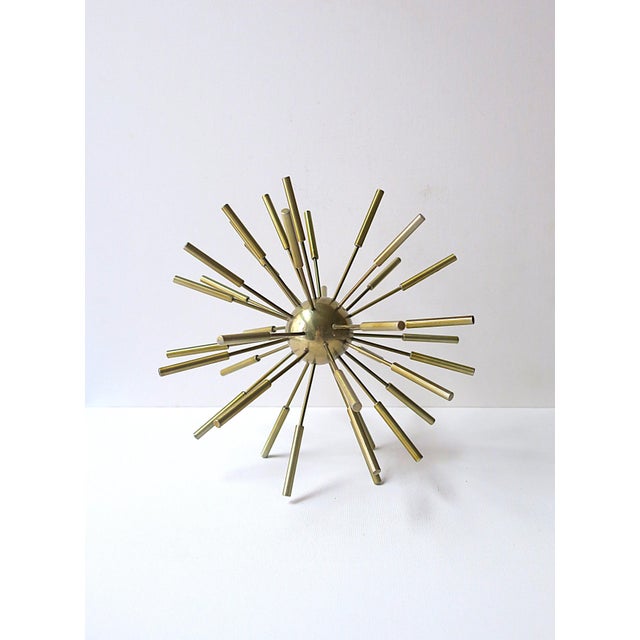A brass sputnik sculpture decorative object. A great piece for a cocktail table, credenza, shelf, display on top of books,...