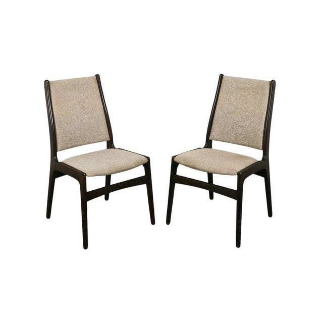 A set of 4 Danish Mid Century Modern dining chairs. The chairs are simple in design and quite functional. They appear...