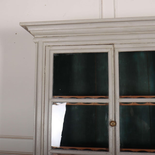 Pretty early 19th century Welsh glazed oak and pine kitchen dresser with good storage and original painted interior. 1830....