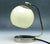 Night light from the 50s. It has a glass shade and metal mount and a base. It is preserved in very good condition. The...