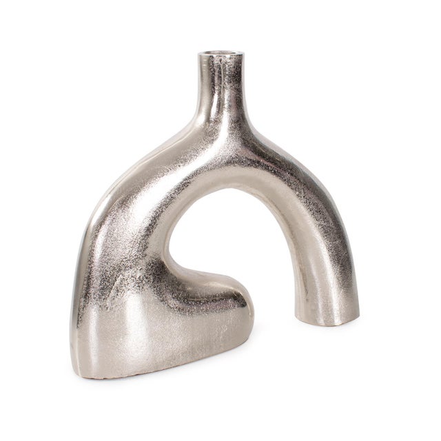 An unexpected sharp turn at the base gives this design its name The Reverse Vase. Crafted in cast Aluminum this creation...