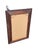 This product is a 19th century American mahogany Empire style wall mirror that has been refurbished. It features a...