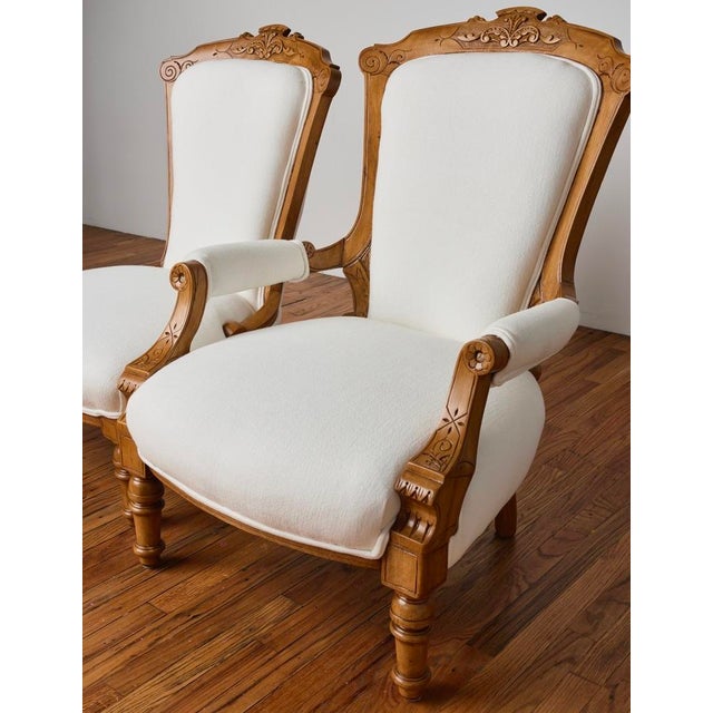 Timeless European pair of 19th-century French Louis XV style armchairs. Masterfully restored and newly reupholstered in a...